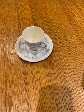 Wedgwood White Cup and Saucer with Light Blue Scroll Motif